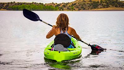 Women on a kayak at Farmington Lake.